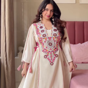 Women’s Cream Embroidered Long Kurti with Multicolor Circular Motifs and Tassel Accents – Heritage-Inspired Ethnicwear Portrait