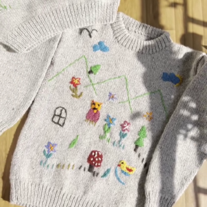Whimsical Nature-Embroidered Knit Sweaters 🐥🍄🌼 – Light Gray Base with Playful Storybook Detailing