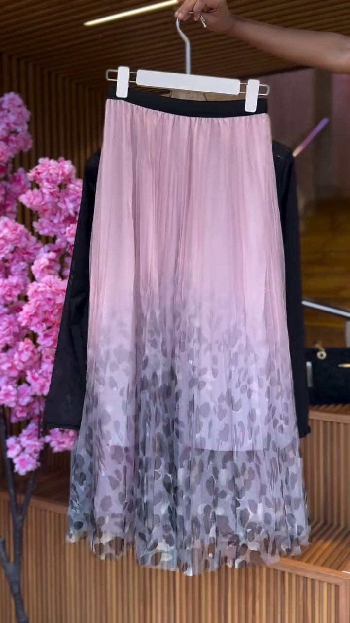 Sheer Sleeve Crop Top in Black & Abstract Pleated Skirt - Image 2