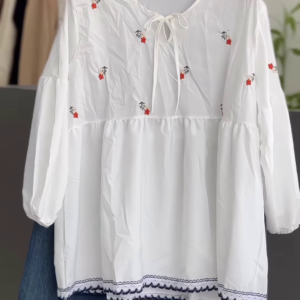 White Floral Embroidered Blouse with Tie Neck – Casual Chic Top Paired with Blue Jeans