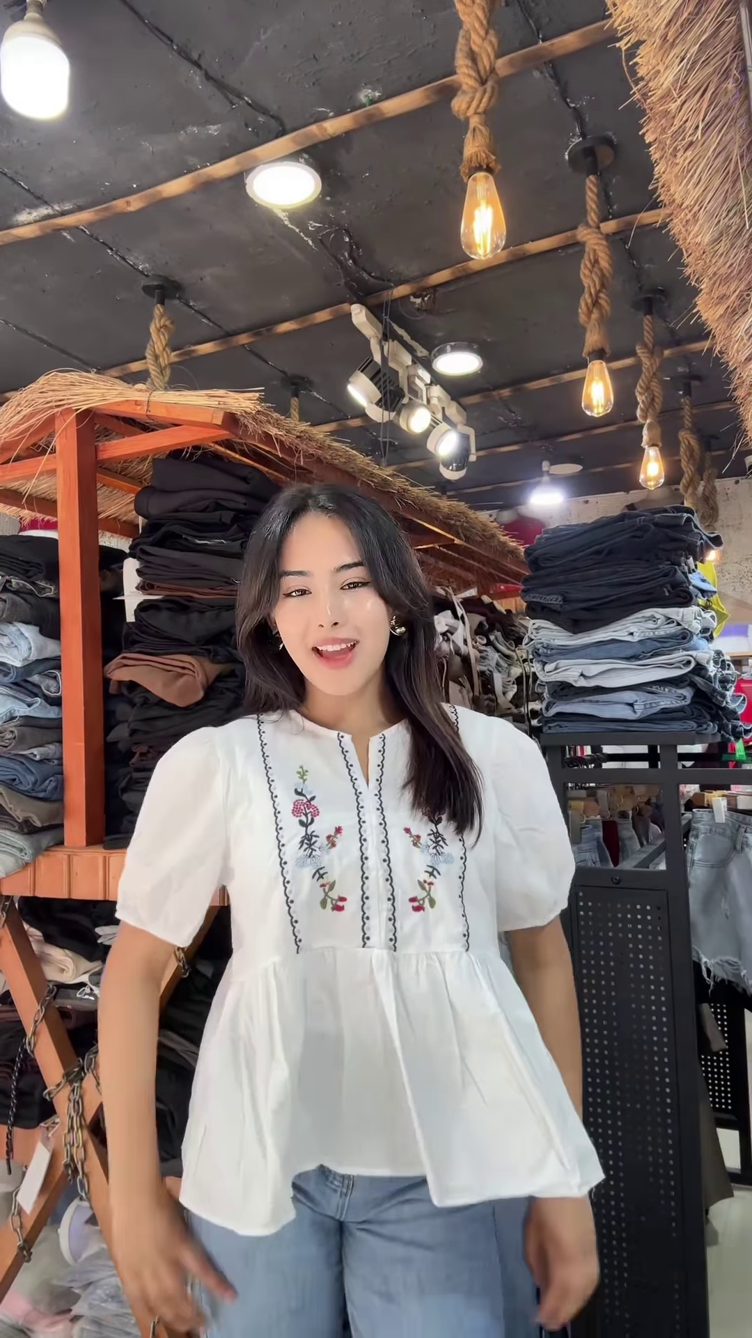 White Floral Embroidered Blouse with Light Blue Jeans – Casual Boutique Look for Women