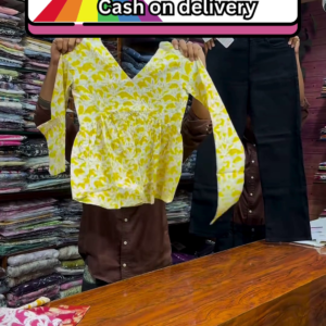 Yellow and White Floral Printed Top Paired with Black Straight-Fit Pants for Women