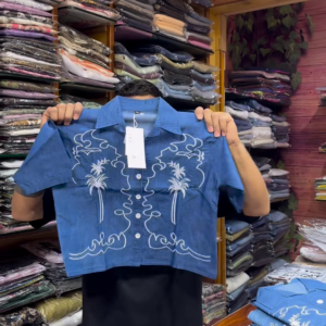 Light Blue Long-Sleeve Shirt with White Floral Embroidery and Button-Front Closure