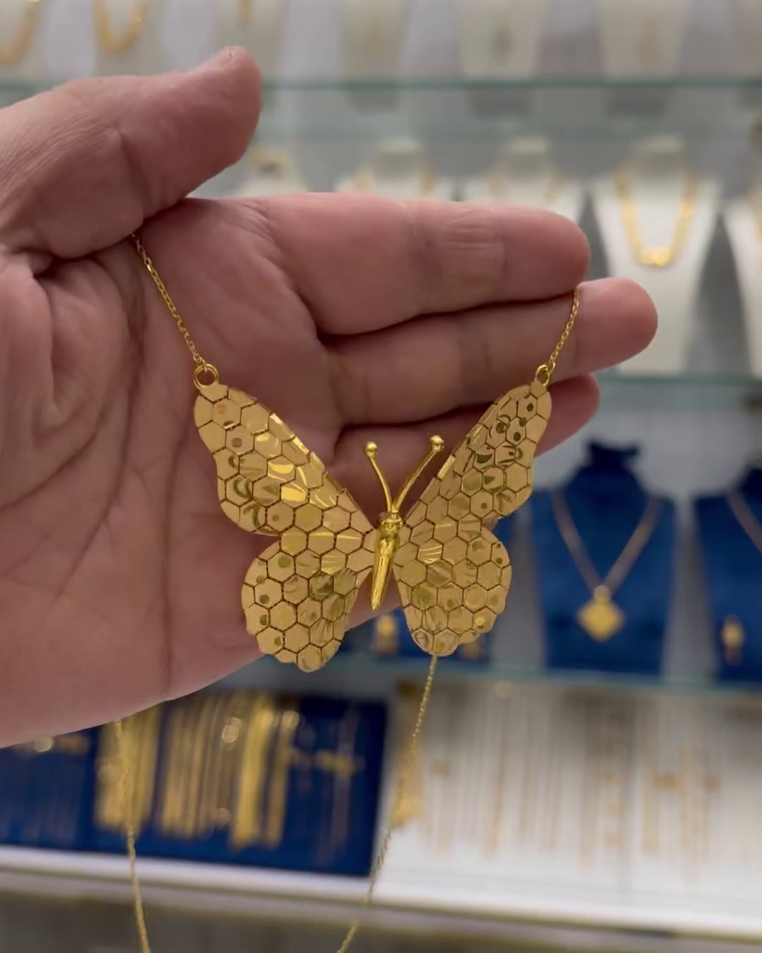 Elegant Butterfly Pendant Necklace – Intricately Designed Gold-Tone Jewelry for Women