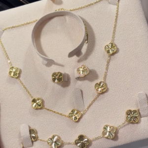Elegant Gold-Toned Four-Leaf Clover Jewelry Set - Necklace, Bracelet, and Earrings