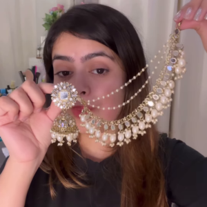 Elegant Gold-Toned Jhumka Earrings with Kundan and Multi-Strand Pearl Earchain