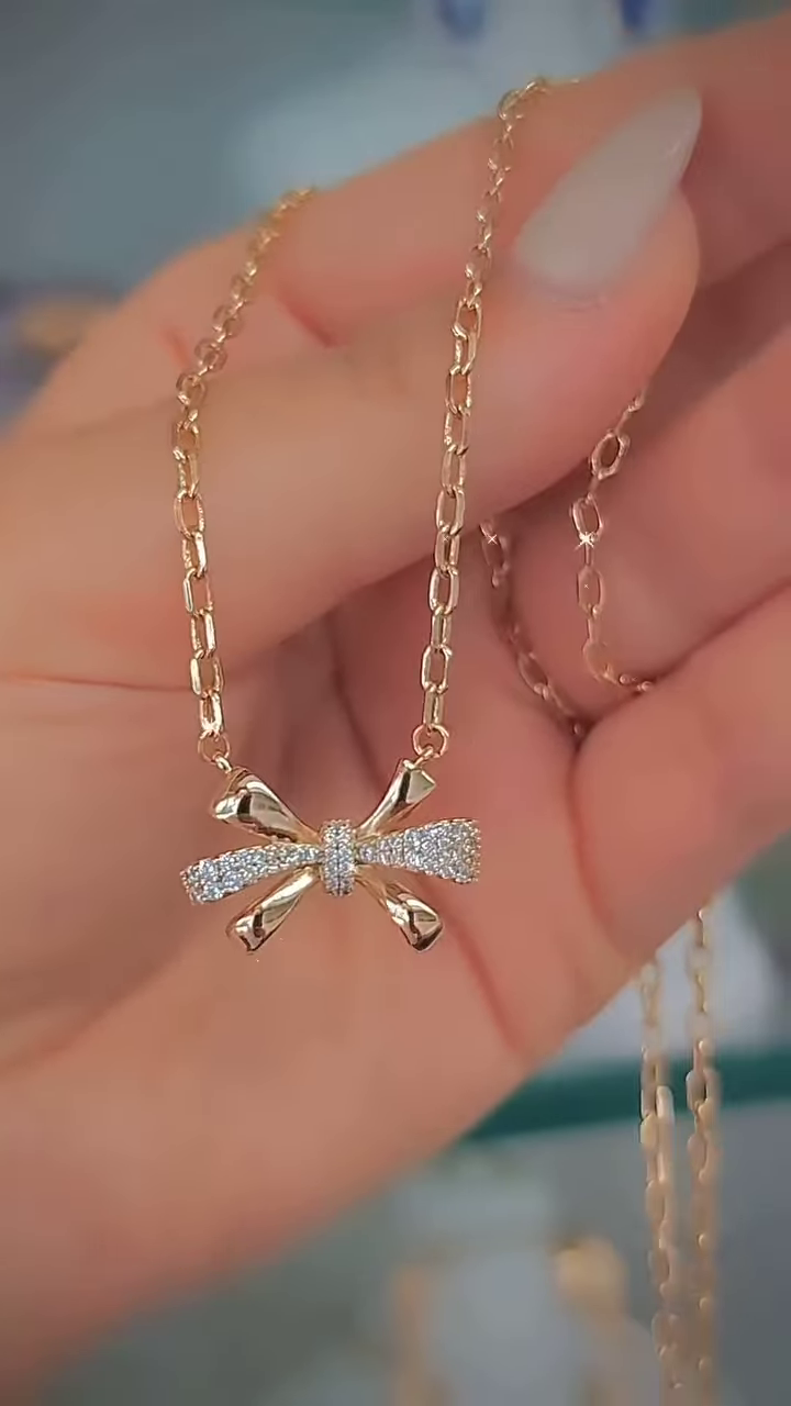 Elegant Rose Gold-Toned Double Heart Necklace with Sparkling Accents - Image 2