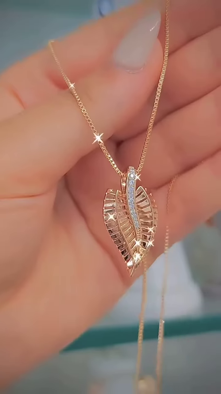 Elegant Rose Gold-Toned Double Heart Necklace with Sparkling Accents - Image 8