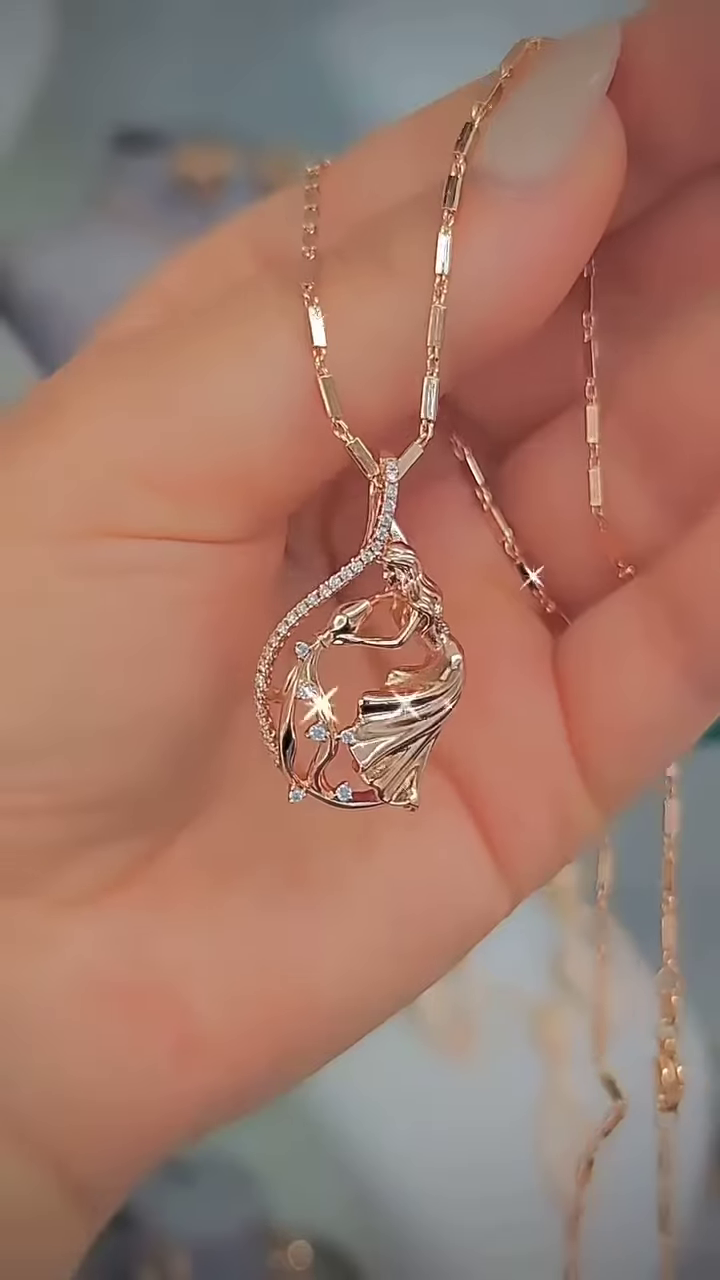 Elegant Rose Gold-Toned Double Heart Necklace with Sparkling Accents - Image 5