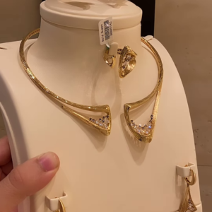 Modern Gold-Toned Jewelry Set with Geometric Cutouts and Crystal Accents - Necklace, Bracelet, Ring, Earrings