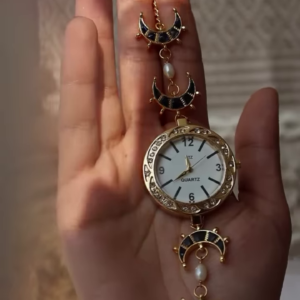 Whimsical Gold-Toned Wristwatch with Crescent Moon and Pearl Accents - Celestial Timepiece