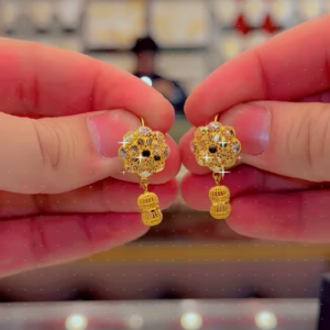 Intricate Gold Jhumka Earrings with Floral Top and Sparkling Accents