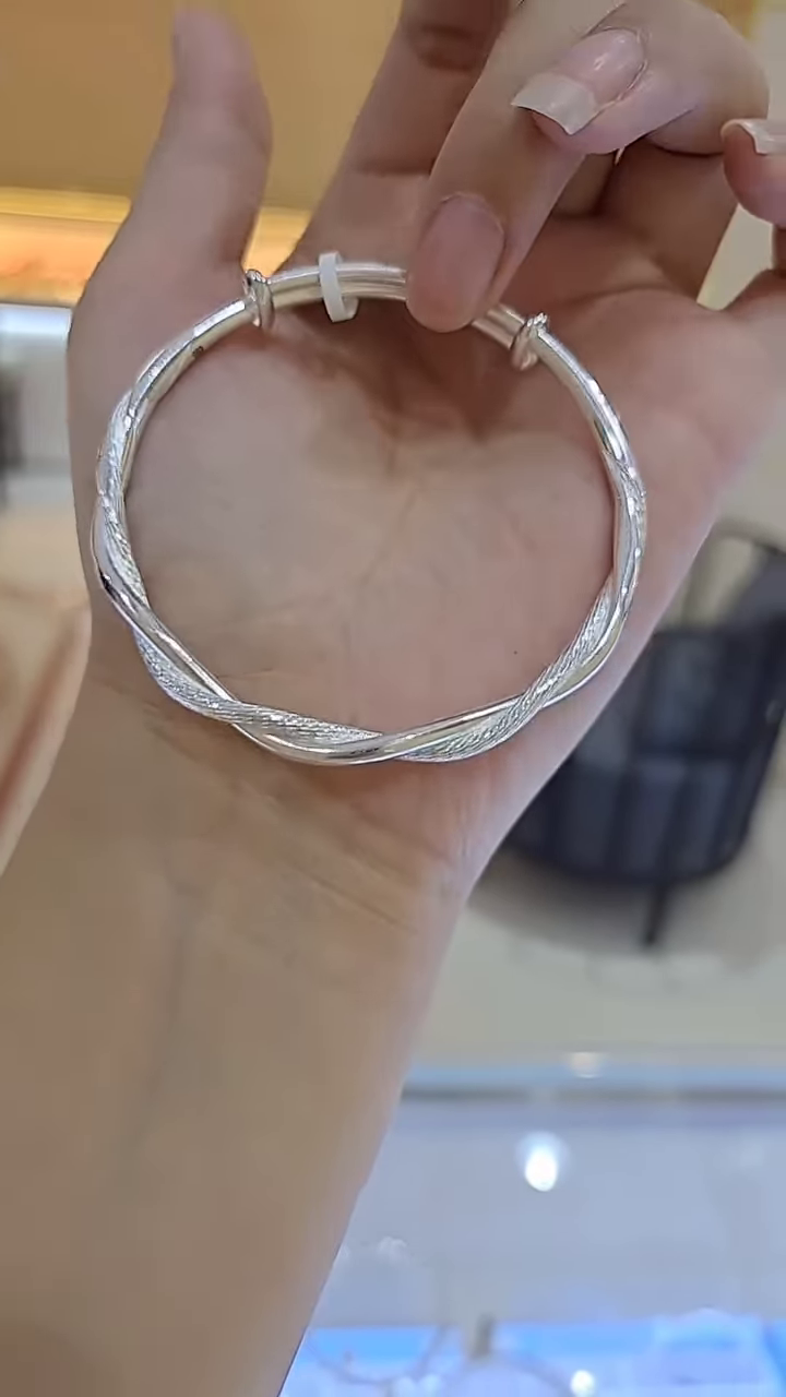 Elegant Twisted Sterling Silver Adjustable Bangle Bracelet - Image 2