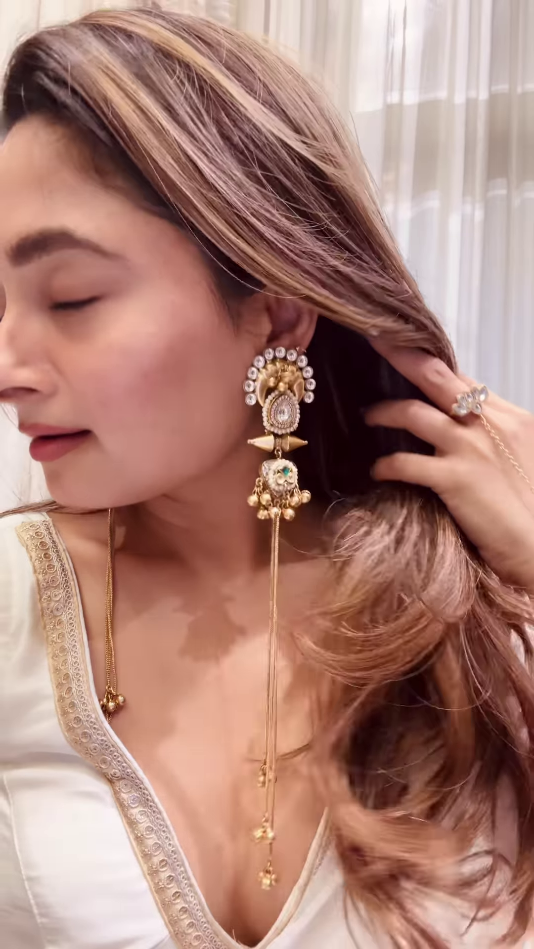 Elegant Gold-Toned Statement Earrings with Intricate Detailing and Chain Drapes - Image 2