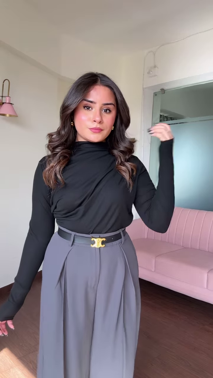 Chic Women's Outfit: Blue Mock Neck Long Sleeve Top and High-Waisted Black Wide-Leg Pants - Image 2