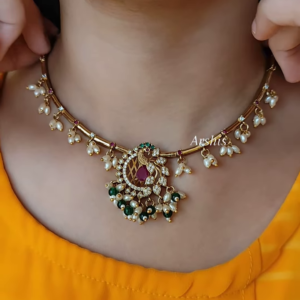 Elegant Gold-Toned Hasli Necklace with Peacock Pendant, Kundan, and Pearl Drops
