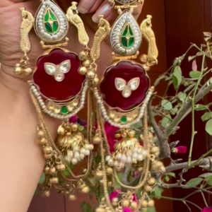 Opulent Gold-Toned Jhumka Earrings with Kundan, Gemstones, and Pearl Details
