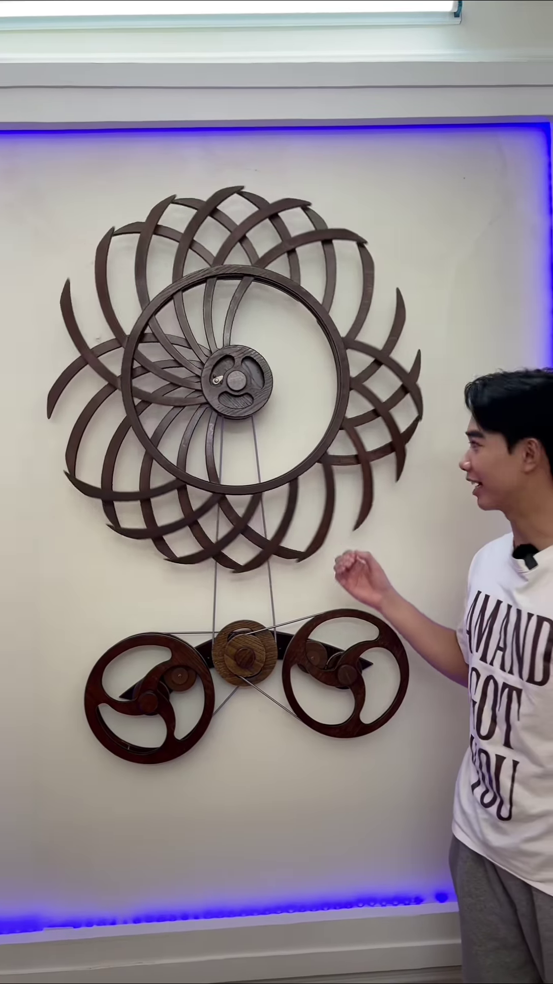 Intricate Kinetic Wall Sculpture with Moving Gears and Abstract Design - Image 3