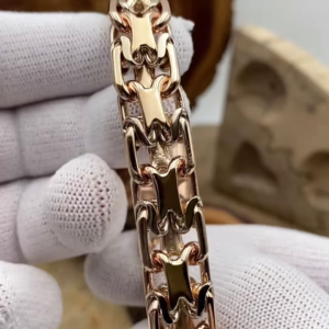 Bold Gold-Toned Link Bracelet with Unique Interlocking Design