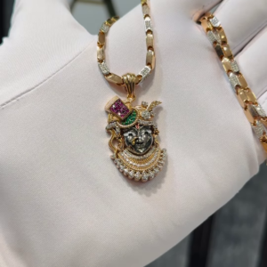Exquisite Gold-Toned Devotional Pendant Necklace with Intricate Gemstone Embellishments and Dual-Texture Chain