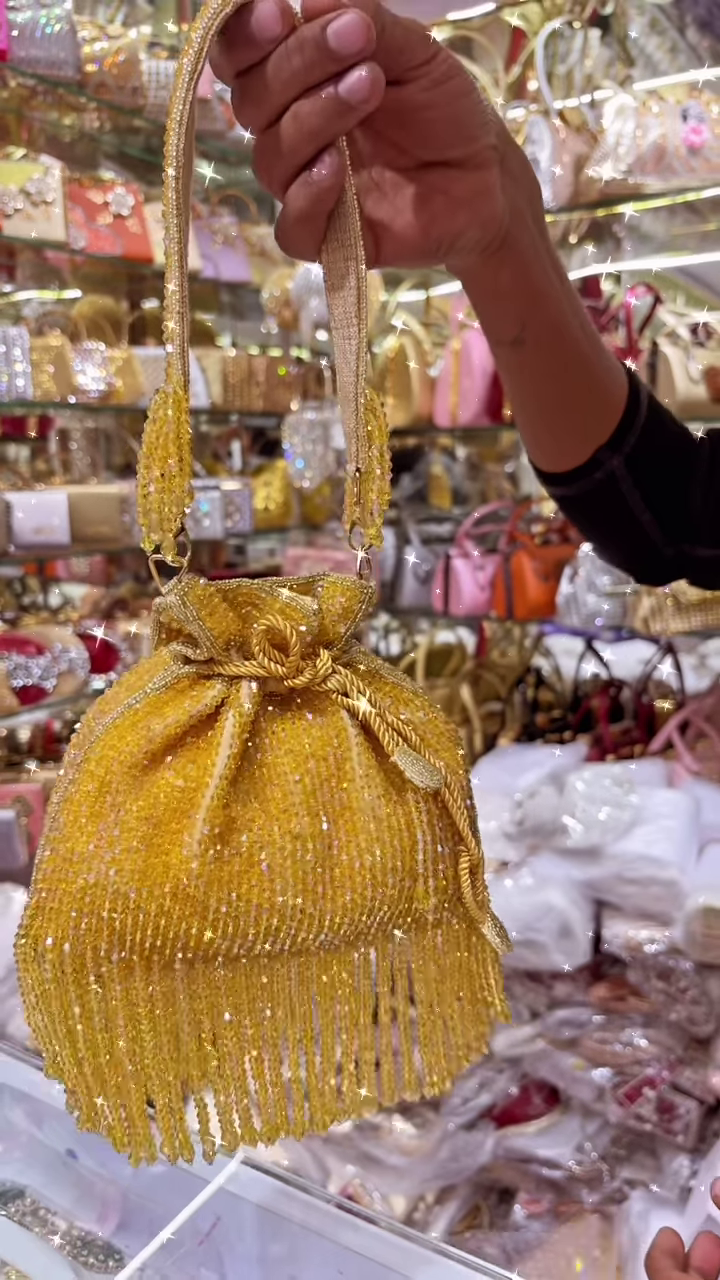 Exquisite White Beaded Potli Bag with Sparkling Embellishments and Tasseled Drawstring - Image 3