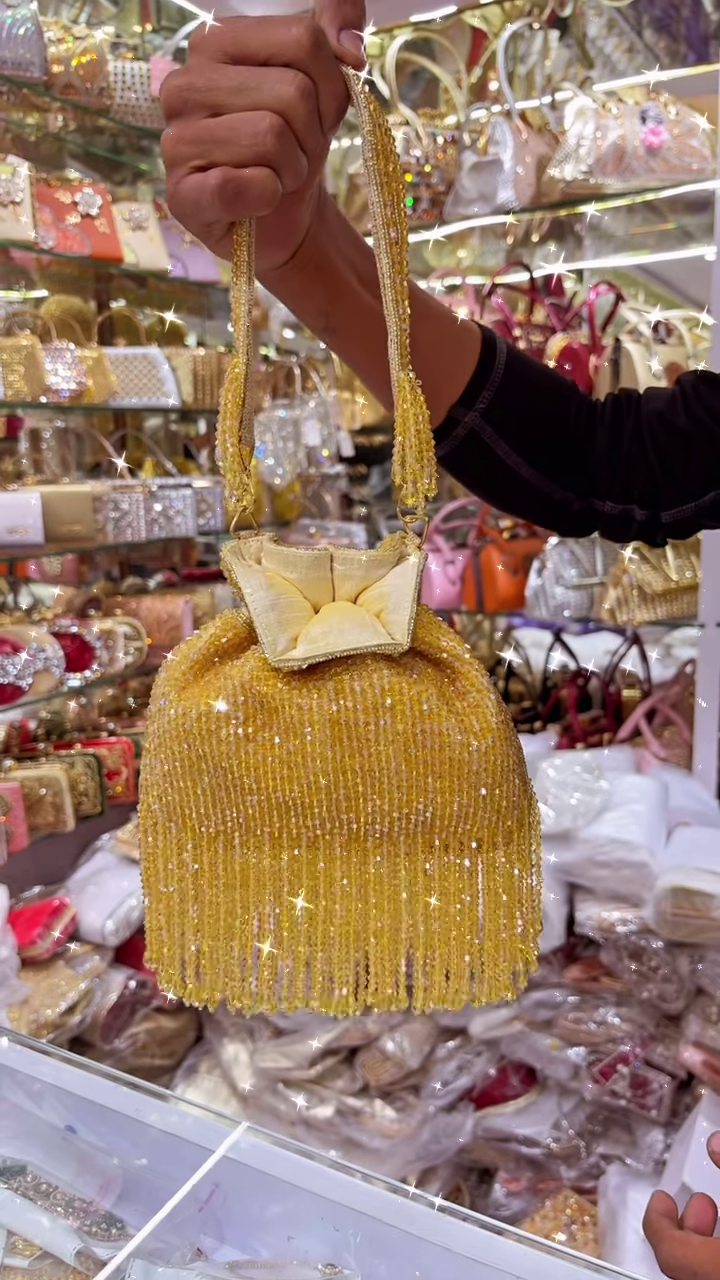 Exquisite White Beaded Potli Bag with Sparkling Embellishments and Tasseled Drawstring - Image 2