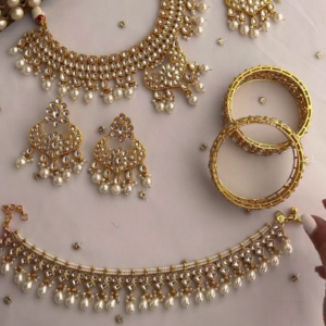 Elegant Gold-Toned Kundan Necklace Set with Pearl Drops