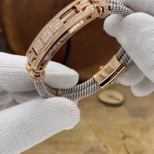 Sophisticated Two-Tone Cable Bracelet with Rose Gold-Toned Accents and Pavé Detailing