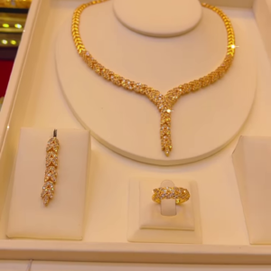 Radiant Gold-Toned Y-Drop Necklace Set with Dazzling Clear Gemstones