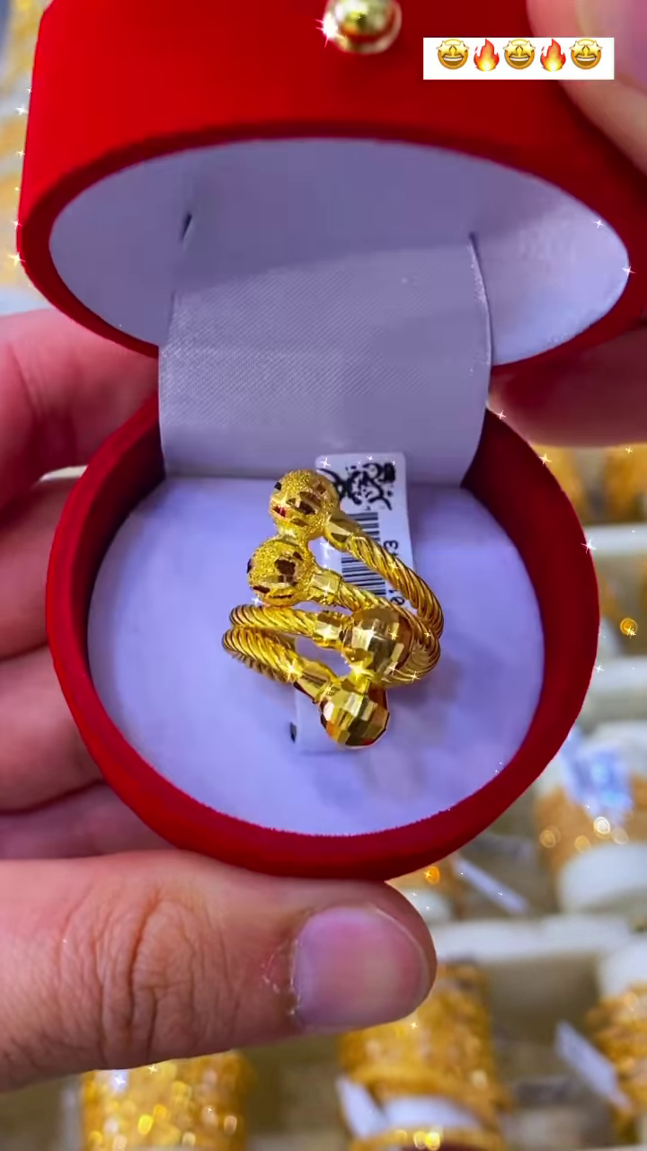 Exquisite Gold-Toned Spiral Ring with Textured Spherical Accents