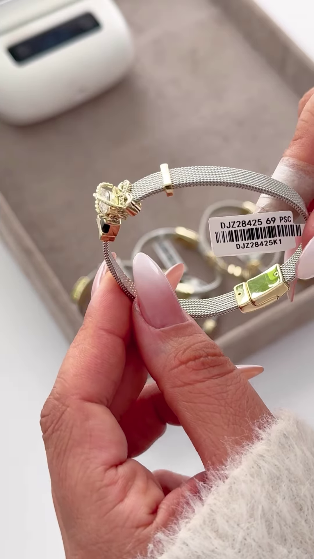 Elegant Silver-Toned Mesh Bracelet with Gold Accents and Crown Charm - Image 3