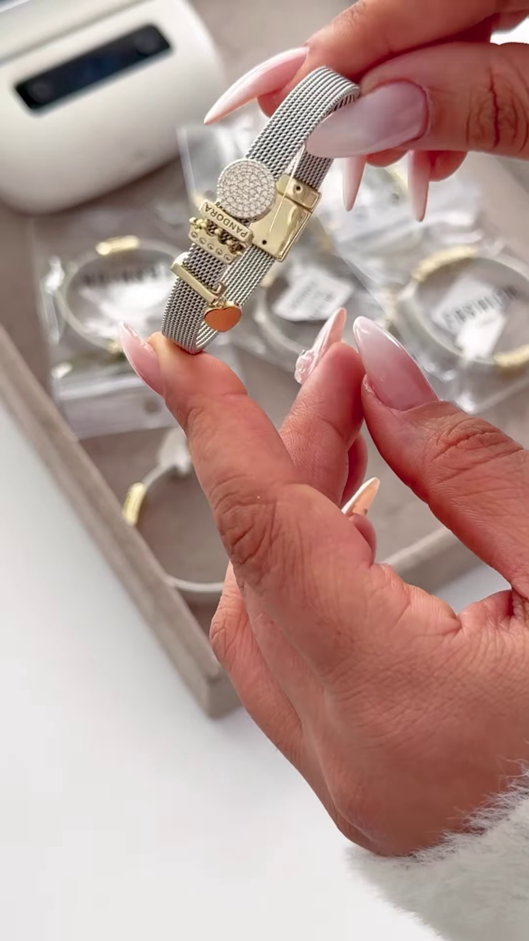 Elegant Silver-Toned Mesh Bracelet with Gold Accents and Crown Charm - Image 4