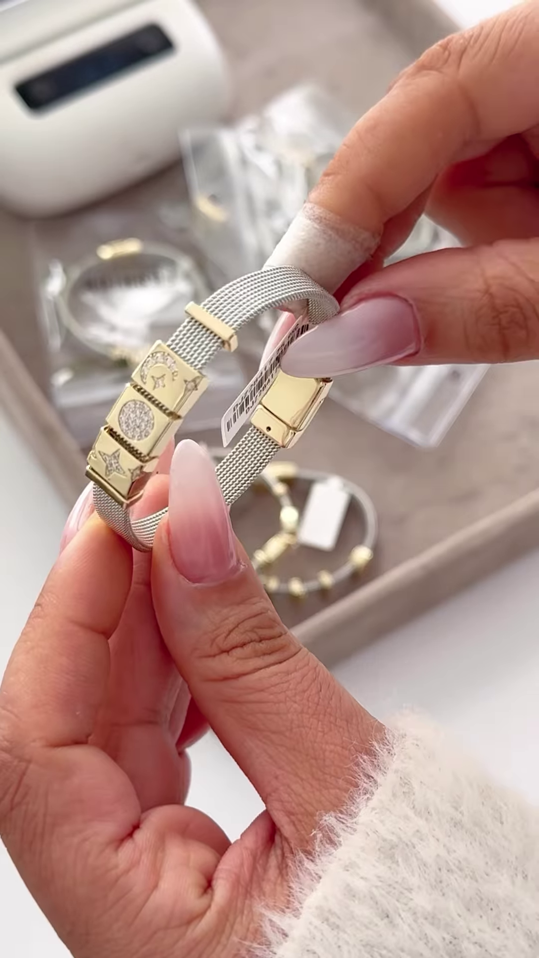 Elegant Silver-Toned Mesh Bracelet with Gold Accents and Crown Charm - Image 2