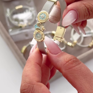 Elegant Silver-Toned Mesh Bracelet with Gold Accents and Crown Charm