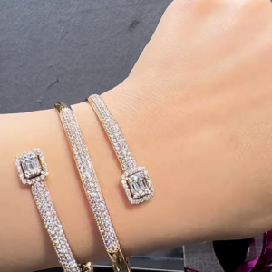 Dazzling Rose Gold-Toned Dual-Bar Bracelet with Pavé Embellishments and Rectangular Gemstones