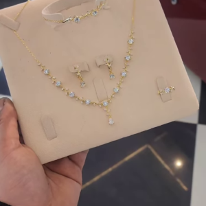 Elegant Gold-Toned Four-Piece Jewelry Set with Dazzling Floral Cluster Gemstones