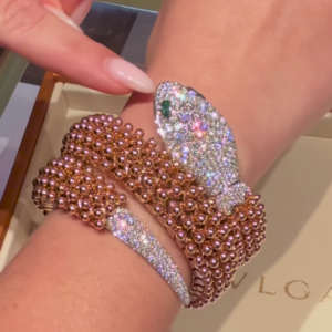Exotic Rose Gold-Toned Coiled Snake Bracelet with Dazzling Clear Gemstones and Emerald-Inspired Eyes