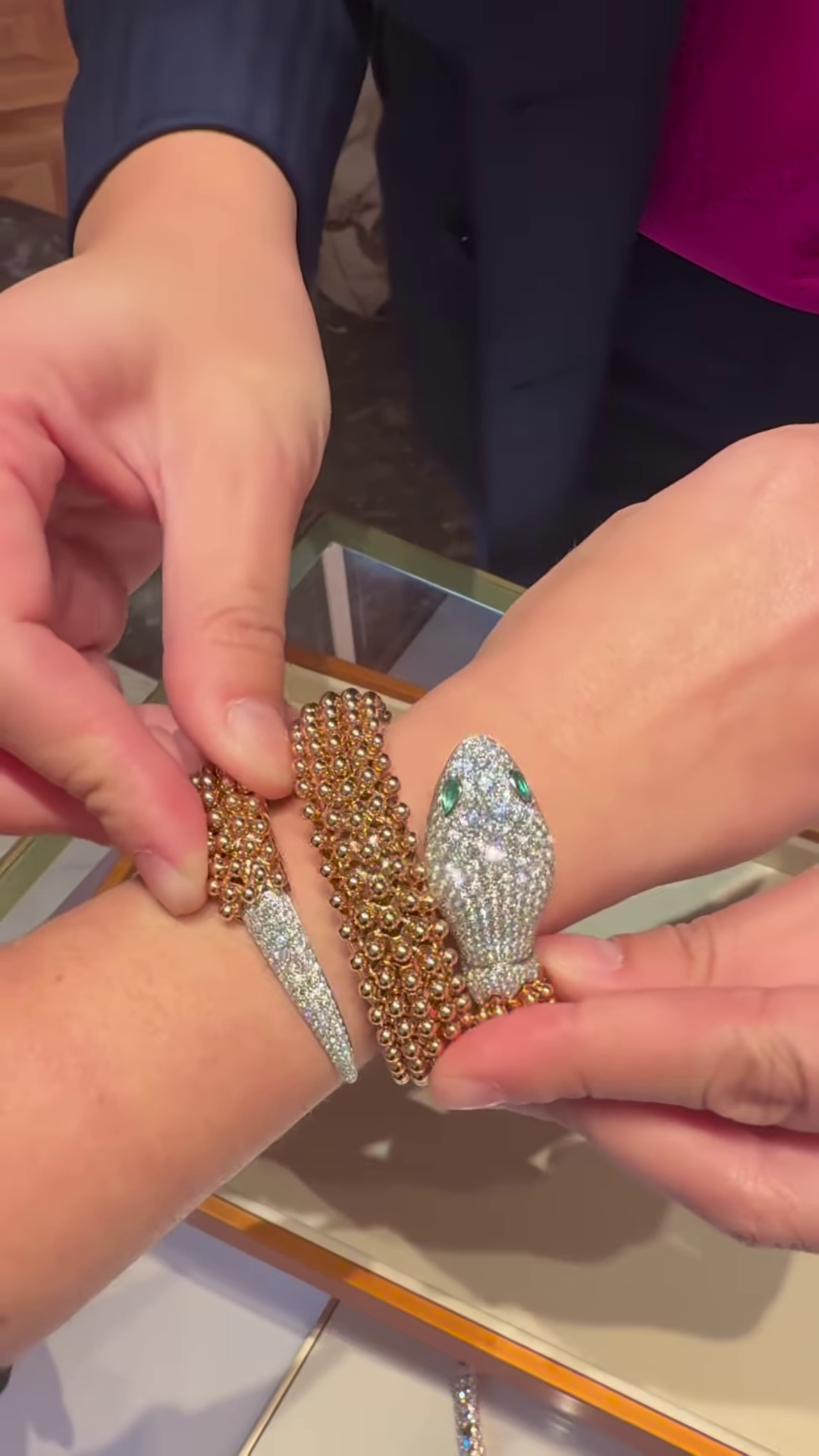 Exotic Rose Gold-Toned Coiled Snake Bracelet with Dazzling Clear Gemstones and Emerald-Inspired Eyes - Image 3