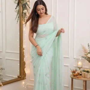 Ethereal Mint Chiffon Saree with Crystal Heart Embellishments